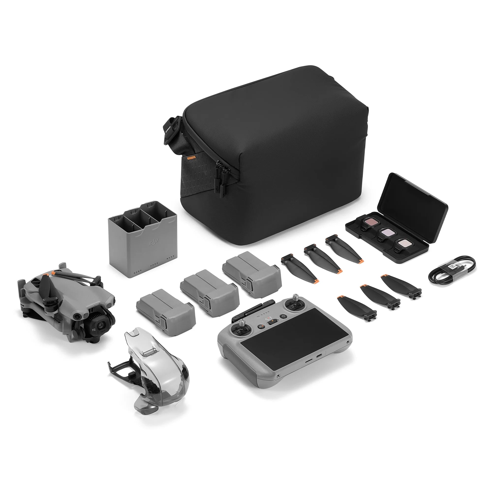 DJI Mini 5 Pro Fly More Combo with RC 2 controller contents on a white background