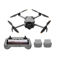DJI Mini 5 Pro with remote control and batteries on a white background